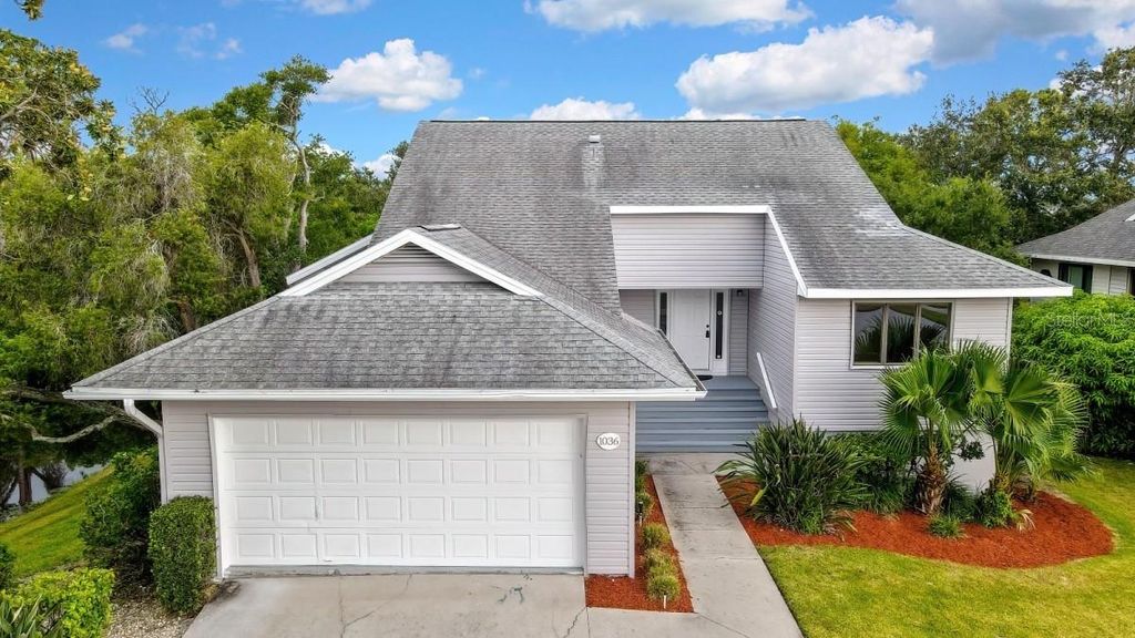 Photo of 1036 Lake Avoca Drive, Tarpon Springs, FL 34689 (MLS # A4659734)