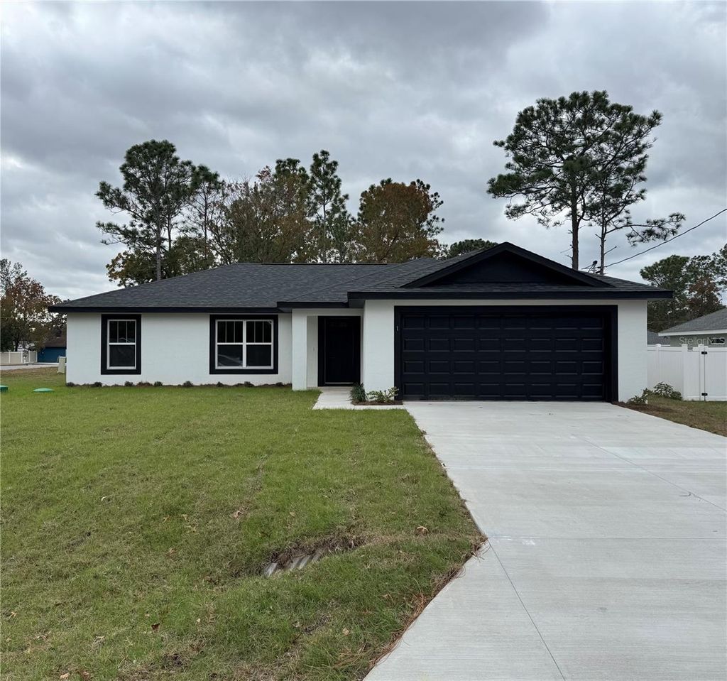 Photo of 26 Banyan Drive, Ocala, FL 34472 (MLS # OM723032)