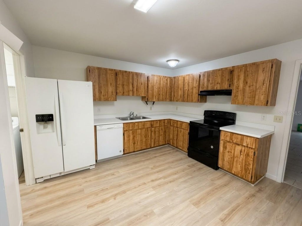 Photo of 5443 Pinetrail Way, Orlando, FL 32822 (MLS # O6448231)