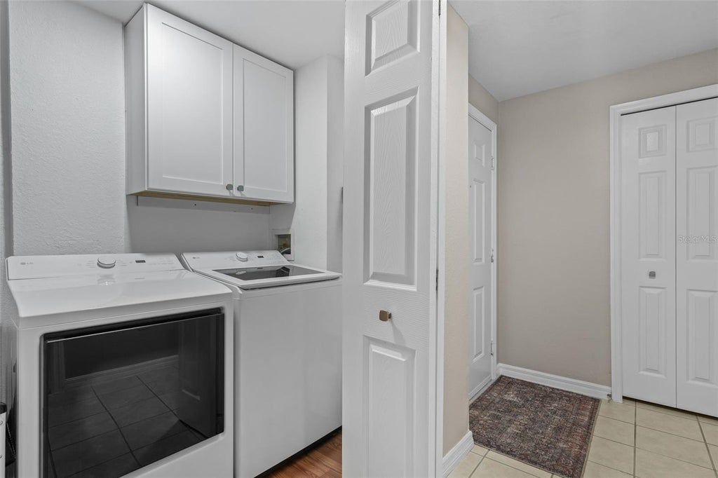 Photo of 6663 Queens Borough Avenue #104, Orlando, FL 32835 (MLS # S5156806)