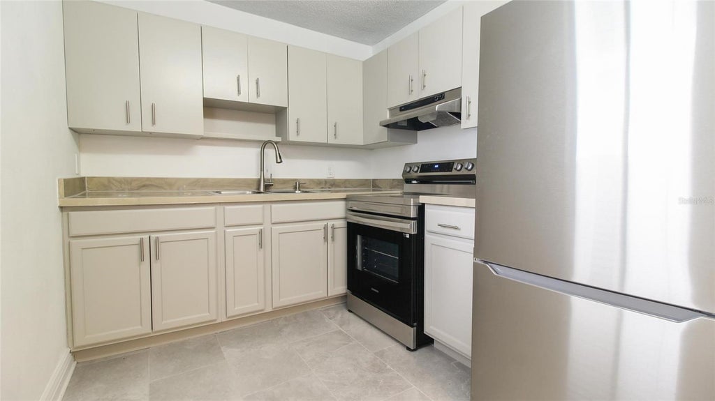 Photo of 2509 Oak Park Way #115, Orlando, FL 32822 (MLS # O6436030)