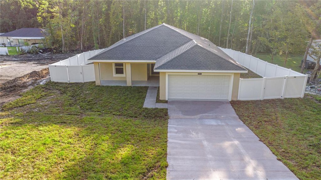 Photo of 12923 SE 41st Ter, Belleview, FL 34420 (MLS # OM711061)
