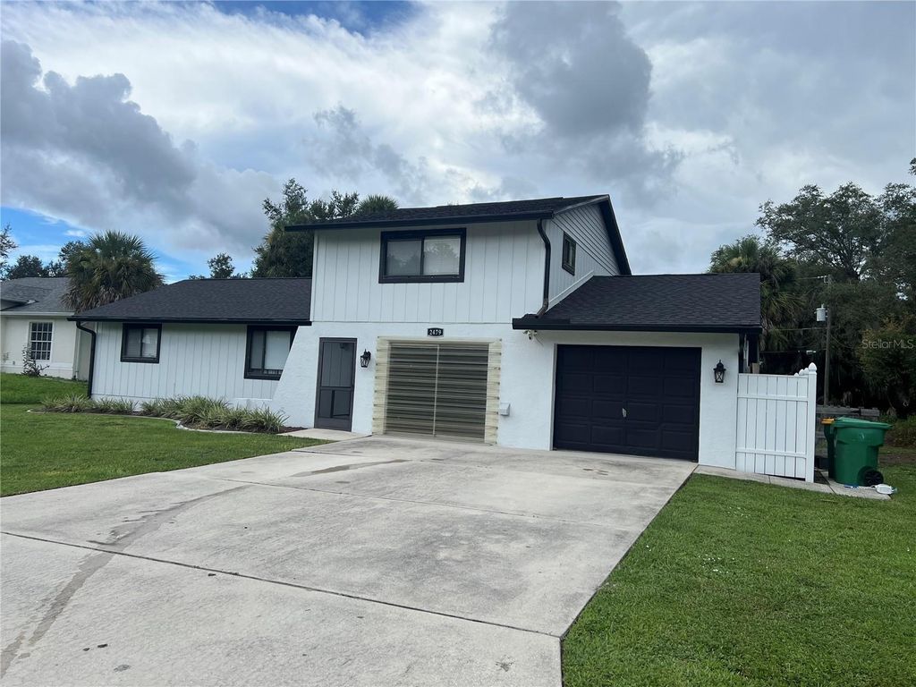 Photo of 2479 Wimpole Street, Port Charlotte, FL 33948 (MLS # C7514640)