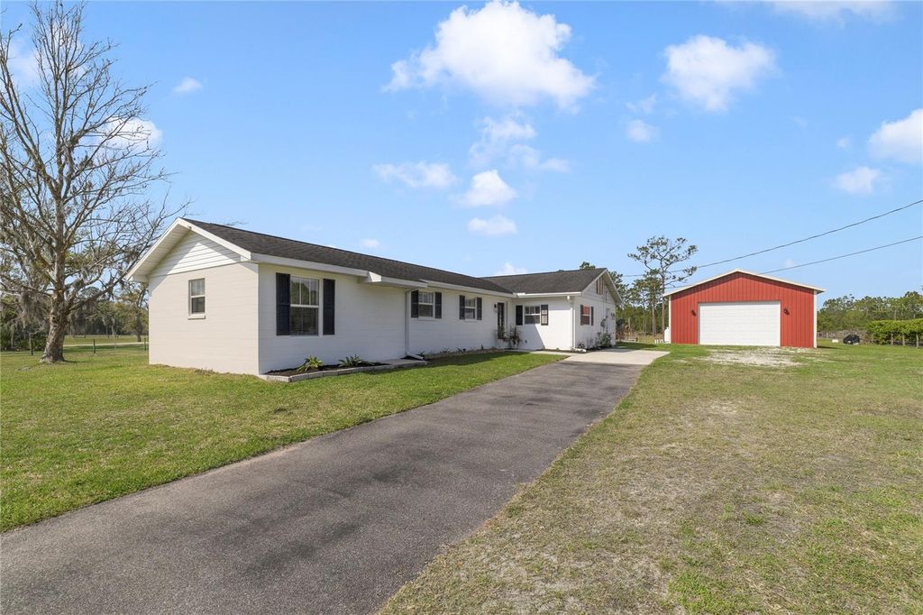 Photo of 1070 Lake Ashby Road, New Smyrna Beach, FL 32168 (MLS # O6394267)