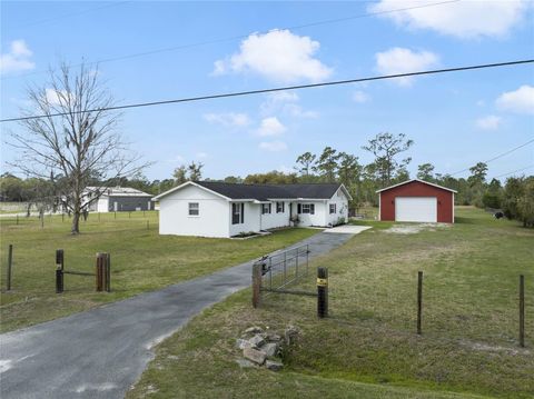 Photo of 1070 Lake Ashby Road, New Smyrna Beach, FL 32168 (MLS # O6394267)