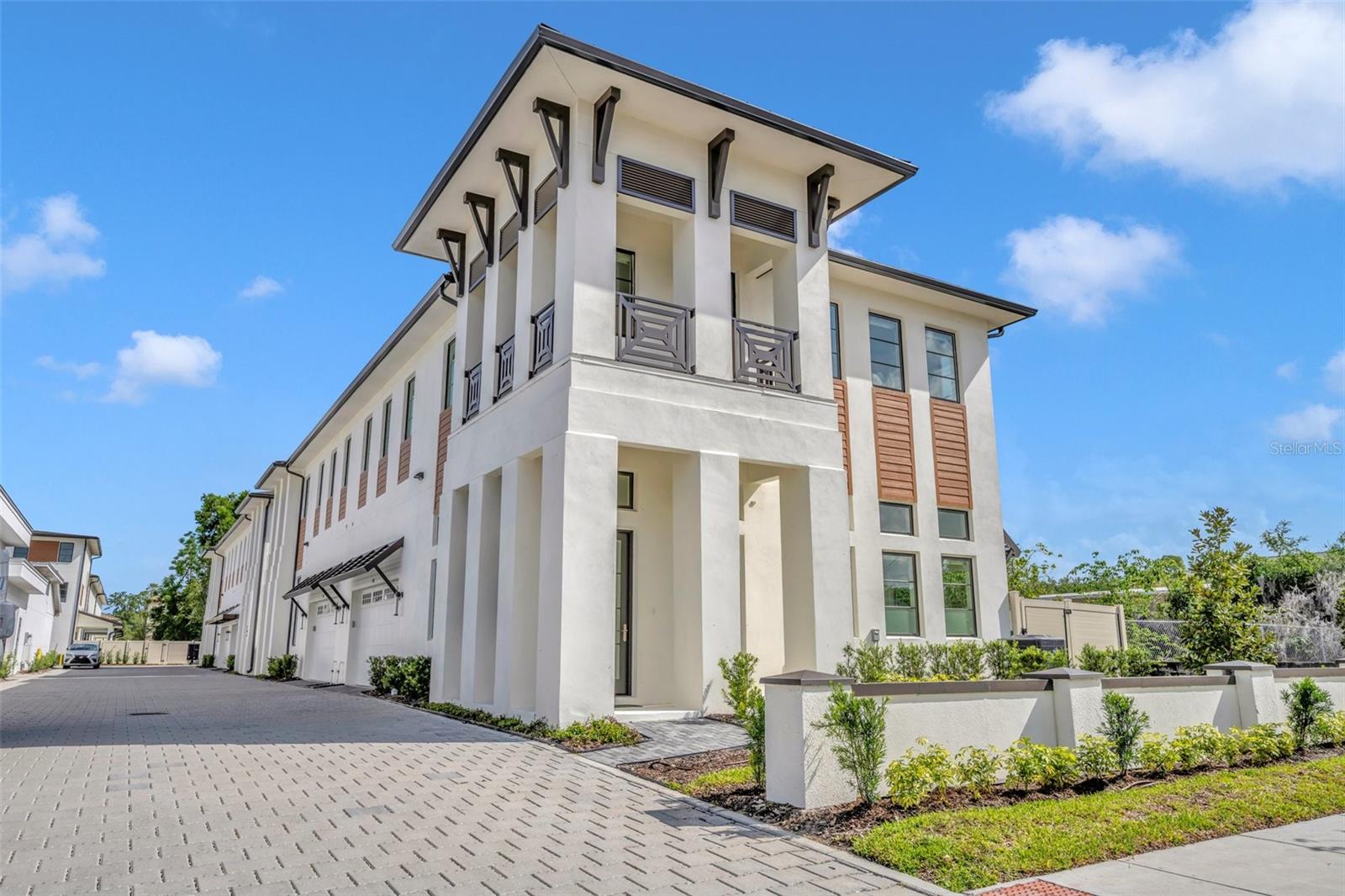 Introducing a rare opportunity to own a brand-new, luxury modern townhome just steps from Park Avenue in the heart of Winter Park. This stunning two-story, all-block construction residence offers the perfect blend of design, quality, and location—within walking distance to Hannibal Square, Rollins College, upscale dining, boutique shopping, and more. Inside, soaring 13-foot ceilings, custom wood flooring, Pella double-pane windows, and an abundance of natural light set the tone for sophisticated living. The chef’s kitchen is a showstopper, featuring flat-panel cabinetry, Quartz countertops, a Wolf gas cooktop, and Sub-Zero appliances. Every inch is thoughtfully designed, with recessed lighting, level 4 smooth wall finishes, and prewiring for surround sound, cameras, and a full security system. Upstairs, enjoy two guest suites, a spacious laundry room, and a luxurious primary suite with an oversized walk-in closet and spa-inspired bath. The townhome also includes a two-car garage with insulated steel doors and a rare 40x11’ private fenced side yard. This is exclusive Winter Park living at its finest—DM to schedule your private showing.