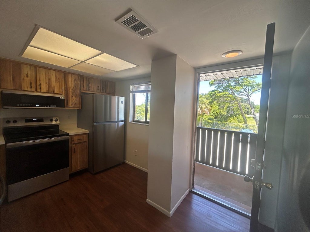Photo of 1712 University Ln #307, Cocoa, FL 32922 (MLS # O6424754)