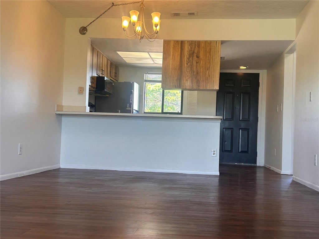 Photo of 1712 University Ln #307, Cocoa, FL 32922 (MLS # O6424754)