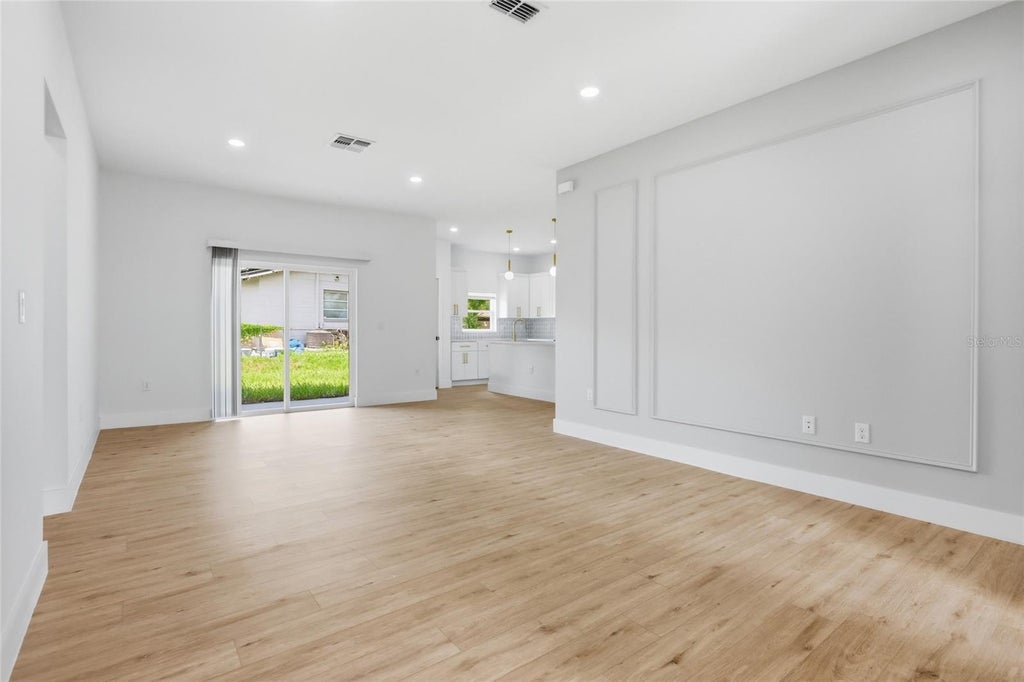 Photo of 5201 Ashwood Place, Orlando, FL 32808 (MLS # O6418981)