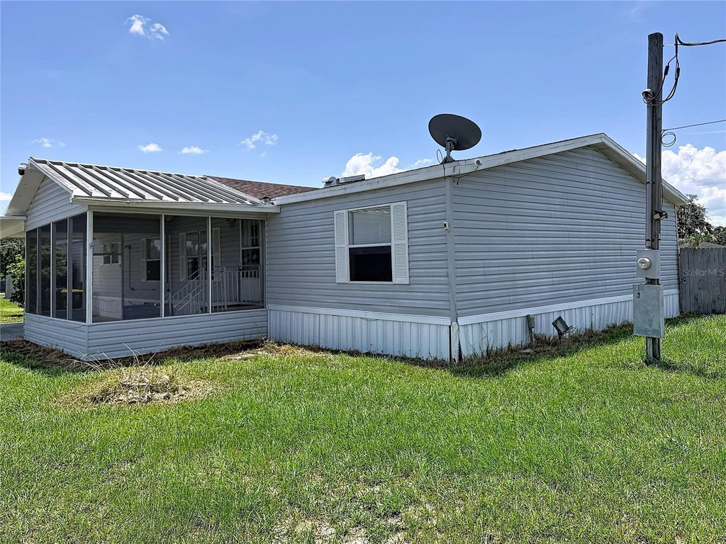 Photo of 4300 Meadow Ridge Avenue, Mulberry, FL 33860 (MLS # TB8536766)