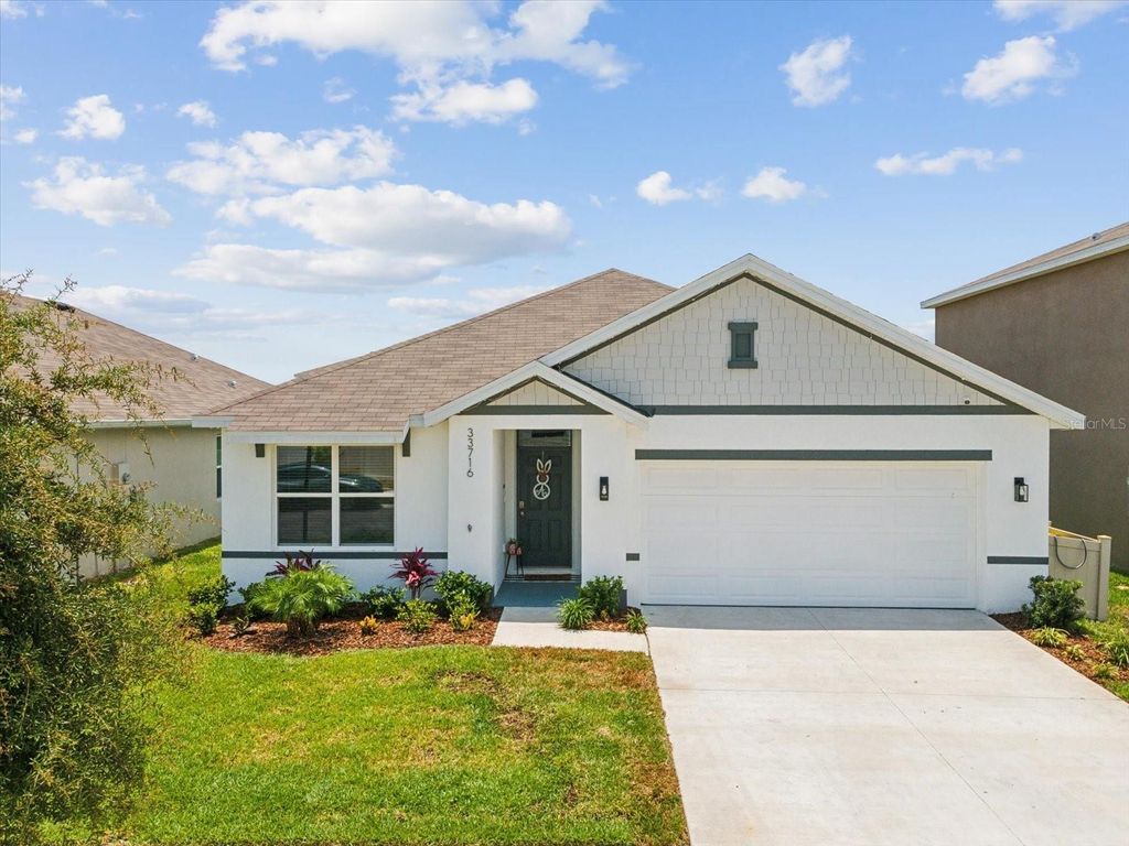 Photo of 33716 Elm Hill Branch, Wesley Chapel, FL 33545 (MLS # TB8389983)