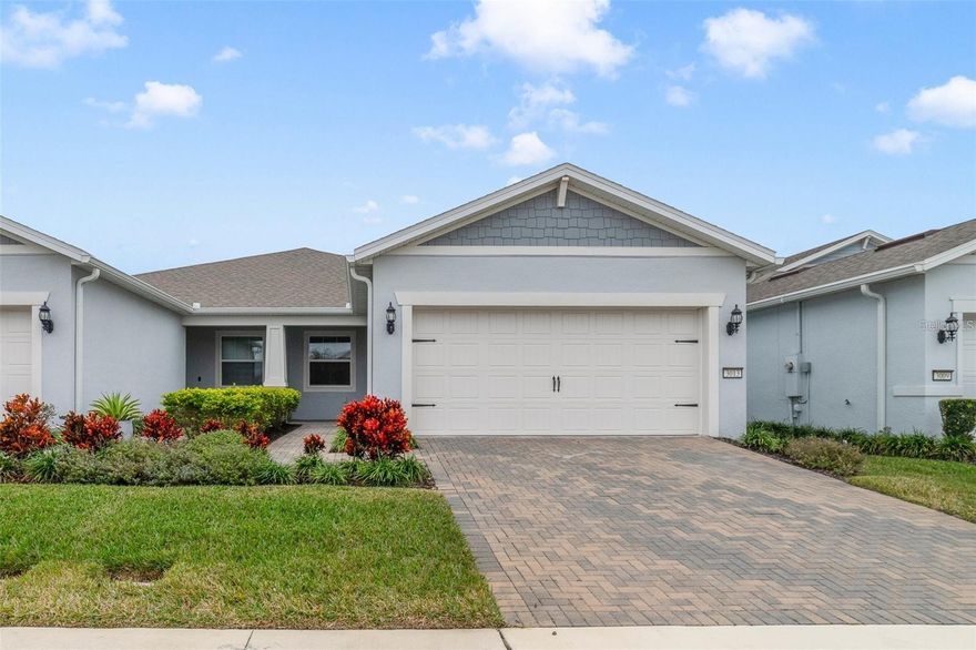 One or more photo(s) has been virtually staged. One or more photo(s) has been virtually staged. Seller may consider buyer concessions if made in an offer **WELCOME HOME** HOME COMES WITH A 13 Month HOME WARRANTY along with a 10 YEAR WARRANTY ON THE AIR CONDITIONING UNIT! Beautifully UPGRADED turn-key Villa near Lake Nona with a light and bright modern design and access to incredible AMENITIES in this GUARD GATED active adult community! Surrounded by the natural beauty of the master planned Sunbridge community offering unsurpassed RESORT STYLE LIVING, relaxation, convenience, and luxury. This ideal layout delivers 3 oversized bedrooms, 2 full bathrooms and OPEN CONCEPT LIVING. Features of this home include; modern cabinetry, sleek fixtures and lighting, and elegant quartz countertops that highlight counter spaces throughout the home. Durable porcelain WOOD LOOK TILE flooring creates an upscale aesthetic you will enjoy while making maintenance a breeze. The exterior of the home offers a SCREENED LANAI that is pre-plumbed for a Summer kitchen, lush landscaping, paver driveway and a private covered entry. No immediate rear neighbors creates a lovely view and adds privacy to this end-unit. There is an option for natural gas and energy-efficient systems to minimize electric and water usage. The property also has an energy efficient Tankless Water Heater. The new owner will appreciate the close proximity to all the incredible amenities that Del Webb Sunbridge has to offer - an expansive 27,000 square foot clubhouse, fitness center, an array of classes and clubs to join, community events, pool and so much more. Schedule your tour today and experience for yourself the vibrant lifestyle of the Sunbridge community and stunning features of this gorgeous home!