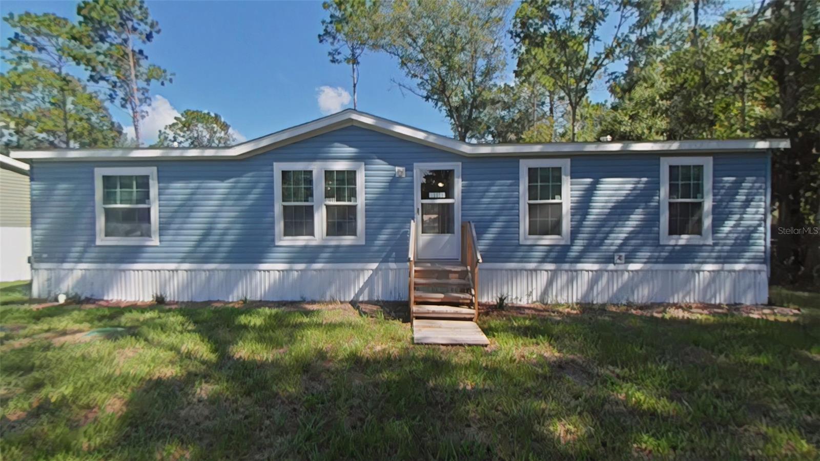 Be the first to live in this beautiful 3 bedroom, 2 bath home with an additional den/office. Bright open floor plan with large kitchen island, walk-in pantry, and plenty of storage. The master suite features a double vanity, walk-in shower, and spacious closet. Vinyl flooring throughout for easy care. Located in a quiet neighborhood in NW Ocala horse country, just minutes from the World Equestrian Center, HITS, shopping, dining.