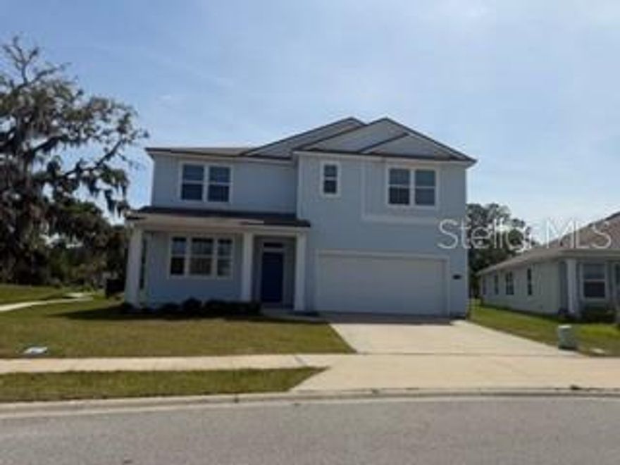 Spacious 5 bedroom, 3 bathroom home located in the desirable Entrada community of St. Augustine. This well-designed floor plan offers comfortable living space with split bedrooms, a downstairs primary suite, and an open kitchen featuring a breakfast bar, kitchen island, pantry, eat-in area, dishwasher, disposal, electric range, microwave, and electric water heater. Interior features include an entrance foyer, walk-in closet, smart thermostat, carpet and tile flooring, central electric heating and cooling, and washer/dryer hookups. Enjoy convenient access to shopping, dining, schools, major roadways, and historic downtown St. Augustine. Community amenities may include pool, fitness center, playground, splash pad, dog park, and walking areas. HOA/CDD fees apply; buyer to verify all fees, restrictions, amenities, room sizes, and information deemed important.