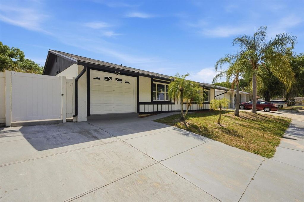 Photo of 1065 Foxwood Drive, Lutz, FL 33549 (MLS # O6402914)