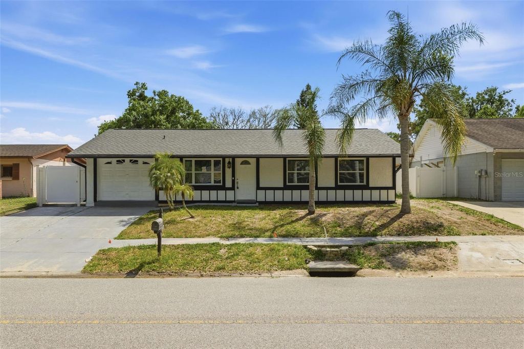 Photo of 1065 Foxwood Drive, Lutz, FL 33549 (MLS # O6402914)