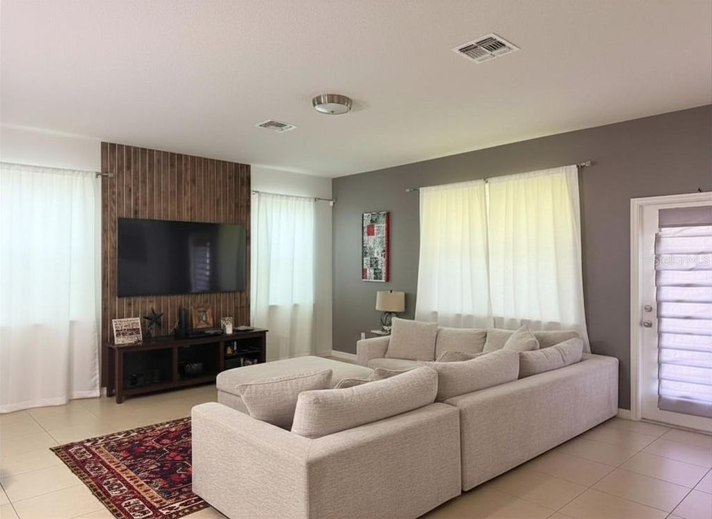 Photo of 708 Marsh Reed Drive, Winter Garden, FL 34787 (MLS # O6405579)