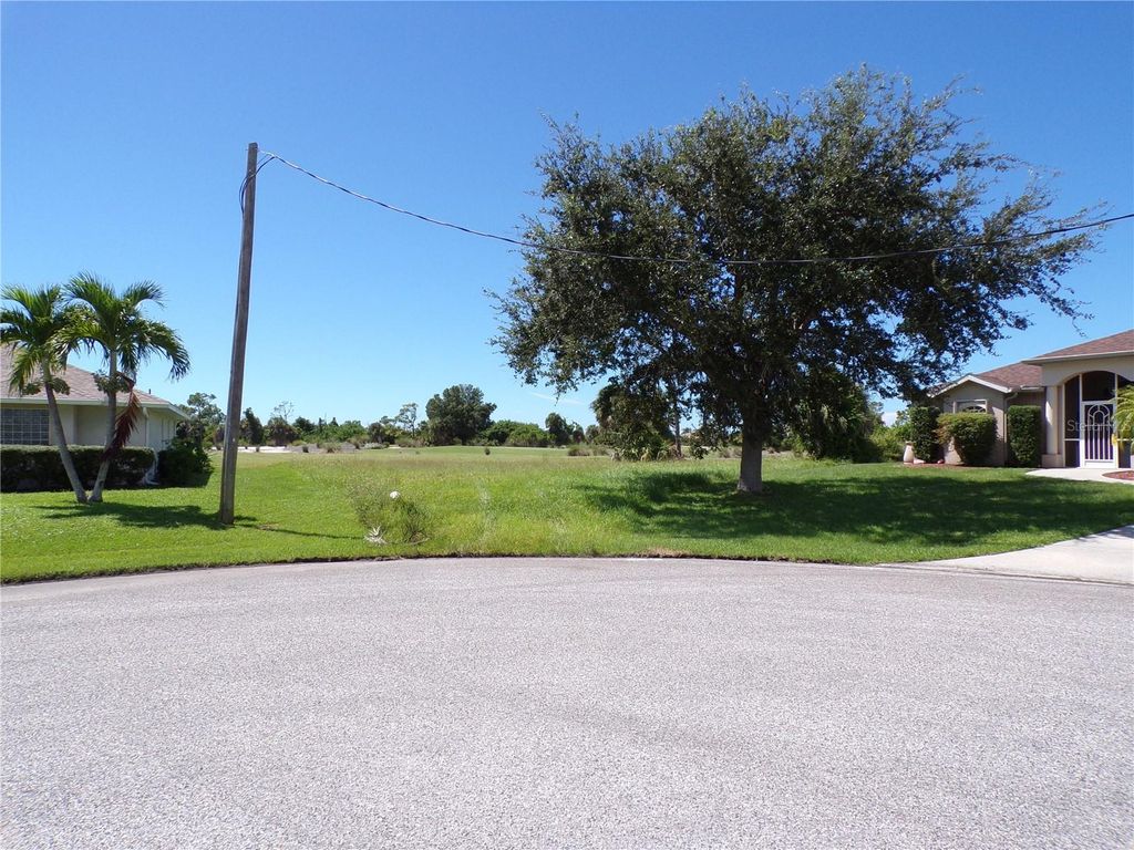 Photo of 25 Clubhouse Place, Rotonda West, FL 33947 (MLS # C7515394)