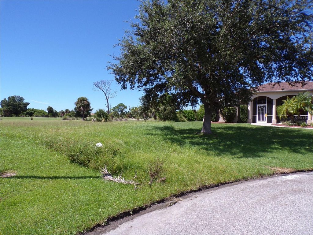 Photo of 25 Clubhouse Place, Rotonda West, FL 33947 (MLS # C7515394)