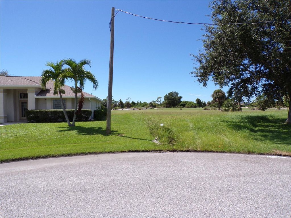Photo of 25 Clubhouse Place, Rotonda West, FL 33947 (MLS # C7515394)