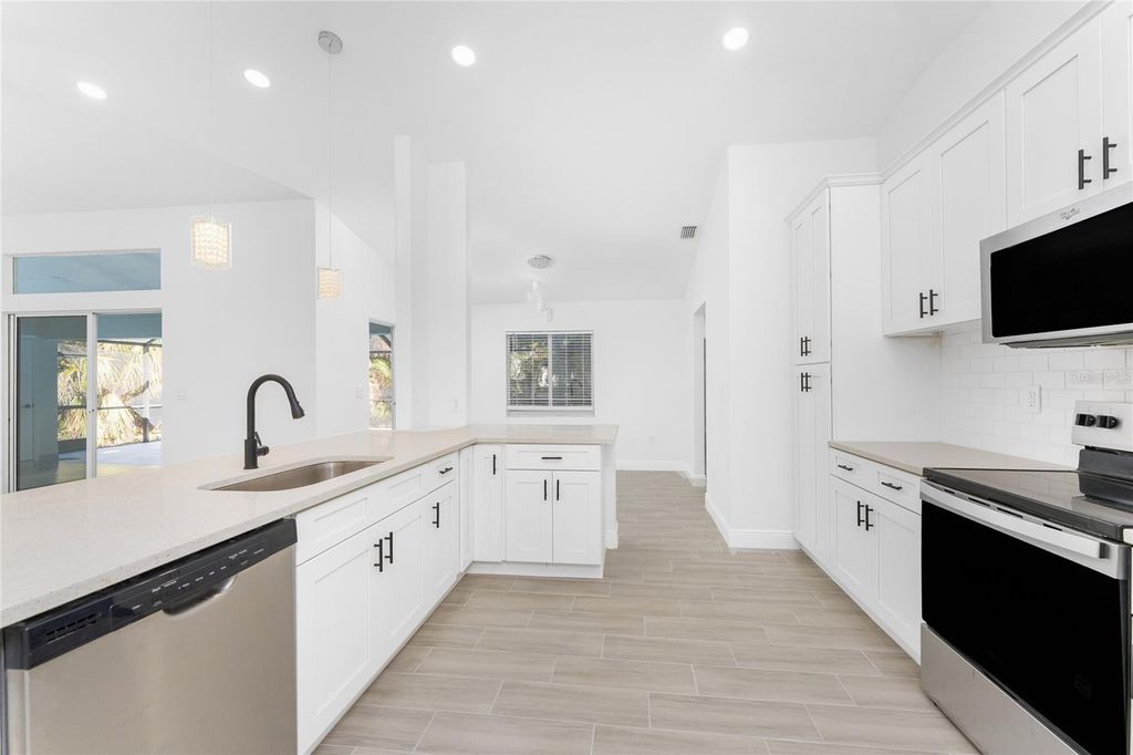 Photo of 1330 Beacon Drive, Port Charlotte, FL 33952 (MLS # C7518560)