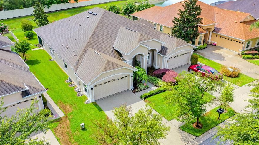 PRICE ADJUSTMENT- Immaculately maintained 3bedroom 2 bath 2013 Southern Crafted Villa located in Desirable Gated Community of Devonwood. This home lives larger than it's approx 1800 sf ft of living space! As you enter you will immediately notice the Volume ceilings, Tray Ceiling in the Separate Dining Room, the Designer tile flooring extends into the Kitchen and Great Room, the Gourmet Kitchen has Granite Countertops, all Stainless Appliances with Double Convection Oven, Upgraded lighting, staggered Wood Cabinets with Crown Moulding, stone backsplash, Walkin Pantry w Designer Glass Door & under cabinet lighting! This home has a Gas Water Heater and the Stove is stubbed out for a future Gas Stove if the buyer desires to put one in. No detail has been left out of this great home, it's Light & Bright with Added Solar Tube in the Kitchen and Double Paned windows throughout, Ceiling fans in every bedroom, Great Room and Lanai.  The Master Bedroom is equipped with a designer light and hidden ceiling fan- truly must see to believe! The Master Bathroom has an Oversized Shower and is equipped with Designer accessibility bar both (both bathrooms are equipped)Double Sinks and Large Walk In closet. Closets are built out with Organizers and Shelving for maximum space utilization.  The Secondary Bedrooms are spacious and Split from the Master for privacy.  The Great Room Overlooks the Scenic Backyard, Enjoy your morning Coffee from the Screened Truss Covered Lanai (plumbed for gas)!  Other upgrades include Water Filtration system, Water Softener, Sink in the Garage, Inside Laundry Room with Shelving and so much more! No CDD, No Flood Insurance required. Great Location near S.R 54 and US 41 (Dale Mabrey)10 minutes to the Suncoast Expway, close to Medical, Schools, Shopping and More! One low Quarterly Fee includes. Basic Cable, Internet, Lawn cutting, trimming, Sprinkler Maintenance, Exterior Painting, Roof.  Seller will also offer $650.00 towards a home warranty of the buyers choice with an acceptable offer. Truly Florida Style Living at it's Finest.  Call Today!