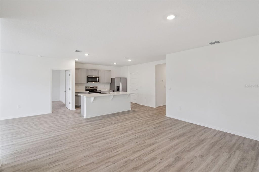 Photo of 4973 Katrina Drive, Haines City, FL 33844 (MLS # O6426892)