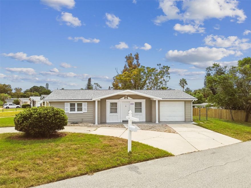 Nicely updated two bedroom home in Beacon Square is move-in ready!  Kitchen features granite countertops & new four piece stainless steel kitchen appliance set.  Roof 2024.  Florida room provides additional living space to suit your specific needs.  Screen enclosed porch in the backyard is a great place to enjoy the beautiful Florida weather.