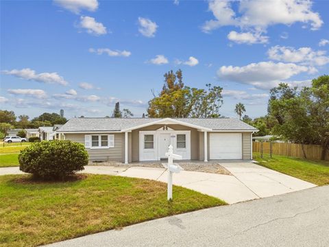Photo of 3704 Oakhurst Drive, Holiday, FL 34691 (MLS # TB8434526) Photo of 3704 Oakhurst Drive, Holiday, FL 34691 (MLS # TB8434526)