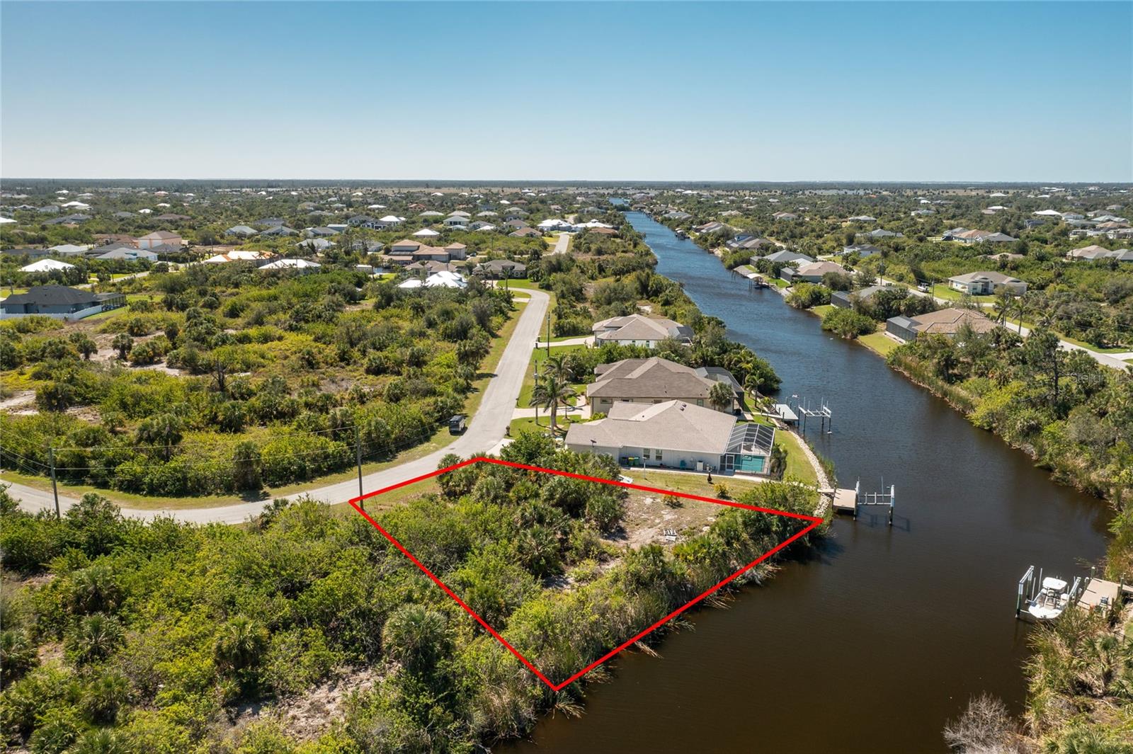 Discover the perfect opportunity to build your dream home on this oversized waterfront lot, boasting 91 feet of water frontage in the desirable community of South Gulf Cove. Situated in a sought-after boating community, this property provides direct access to the Gulf of Mexico, making it ideal for those who enjoy fishing, boating, and waterfront living.
With ample space and wide water views, this lot offers endless possibilities for designing a custom residence with a pool, expansive outdoor living areas, and a private dock. South Gulf Cove is a growing waterfront community featuring over 55 miles of navigable canals, a community park, boat ramps, and easy access to shopping, dining, golf courses, and the pristine beaches of Boca Grande and Manasota Key.
Don’t miss this chance to secure a prime Gulf-access property where you can enjoy Florida’s coastal lifestyle at its finest.