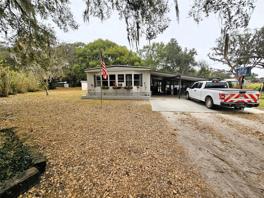 Seize on this great opportunity to add a "hard to find" residential rental to your rental portfolio. Very limited lot size of 1.25 ACRES with Agricultural/Residential zoning offers the possibility to rent or lease at above market rates to prospective tenants who need additional yard size for pets, horses, or livestock. Previous tenant had 2 horses on the property. NO HOA or CDD restrictions or fees! Very conveniently located less than 4 miles to Zephyrhills city limits, 4.7 miles to local hospital, and less than 25 minutes to big box shopping malls. 3BED/2BATH split floor plan with an open layout, island kitchen. AC unit and water heater less than 6 years old. Very quiet location on a dead end lane with very low through traffic. High speed internet access available through either Frontier or Spectrum. Extra storage or hobby space provided by the included 16'x18' workshop with a 8'x12' garden shed.