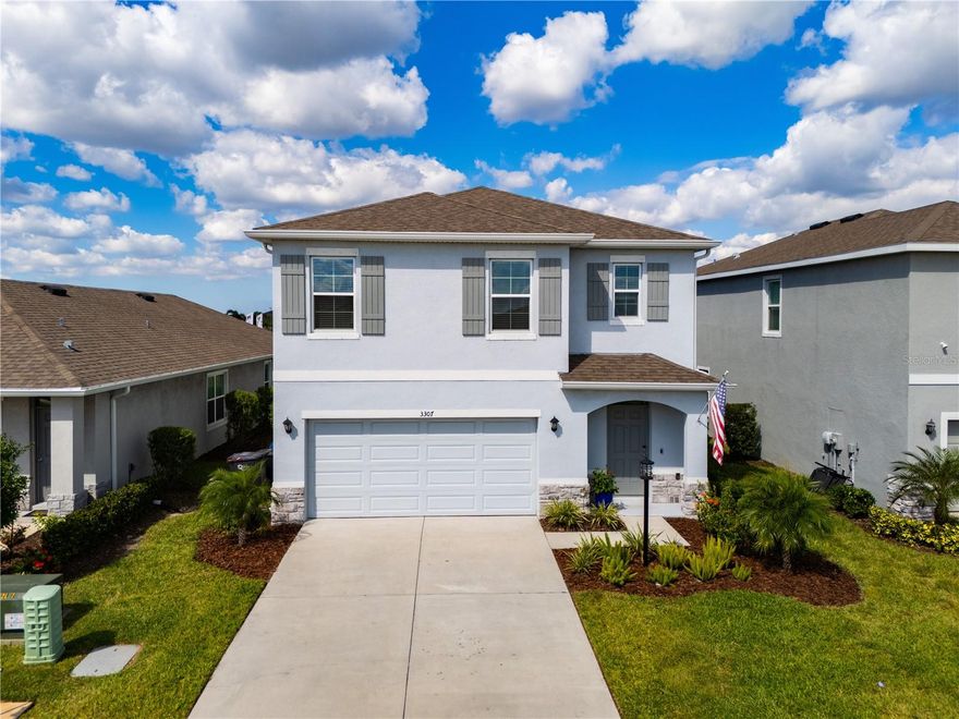Experience the ultimate lifestyle in this five-bedroom, three-bathroom home located in the vibrant Star Farms at Lakewood Ranch. Situated on a prime lot, the front of the residence offers a tranquil water view. The interior features a meticulously designed floor plan with luxury vinyl plank flooring throughout the bedrooms and modern tile in the main living areas. The kitchen is a true centerpiece, showcasing upgraded backsplash, crown molding on the cabinetry, and high-end appliances. Elegant shiplap accents the entryway, hallway, and the kitchen island, while custom closets and a tailored pantry provide exceptional organization.

This home is filled with thoughtful upgrades, including a built-in entertainment unit in the living room, upgraded plumbing fixtures in the kitchen and bathrooms, and glass sliding shower doors. For peace of mind and comfort, the property includes a whole-home water filtration system and an HVAC system enhanced with an LED violet light for air quality. The garage is a standout feature, equipped with its own air conditioning, insulated doors, and a durable epoxy floor. Outdoor living is equally impressive with a fully fenced yard and a screened-in lanai, perfect for enjoying the Florida weather year-round. Practical additions such as gutters, downspouts, and a laundry room sink add to the home's effortless functionality.

One of the most significant advantages of this location is its proximity to the brand-new educational facilities on Rangeland Parkway, including the soon-to-open Rangeland High School and Lake Manatee K-8 which just sits outside the gates of Star Farms, making this a highly desirable area for those seeking modern campus proximity. Beyond the home, Star Farms offers an array of resort-style amenities, including multiple pools, a spa, a fitness center, and a performance center. Residents enjoy a community coffee shop, restaurant and bar, basketball and baseball facilities, and scenic nature trails. Located just a short drive from the world-famous Gulf beaches like Siesta Key, this home perfectly combines a feature-rich interior with an unparalleled community experience.