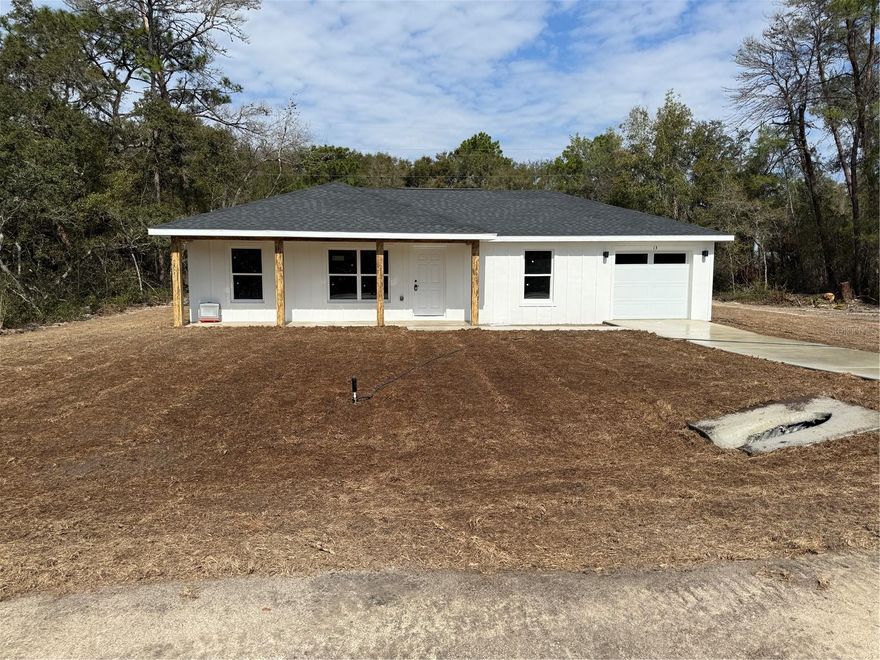 MOVE-IN-READY! Newly constructed home in a quiet community featuring a split floor plan with vaulted ceilings, water-resistant laminate flooring, concrete block construction with stucco finish, architectural shingles, a 20'x5' front porch sitting area, a 5x8 rear porch, private septic, and private well.