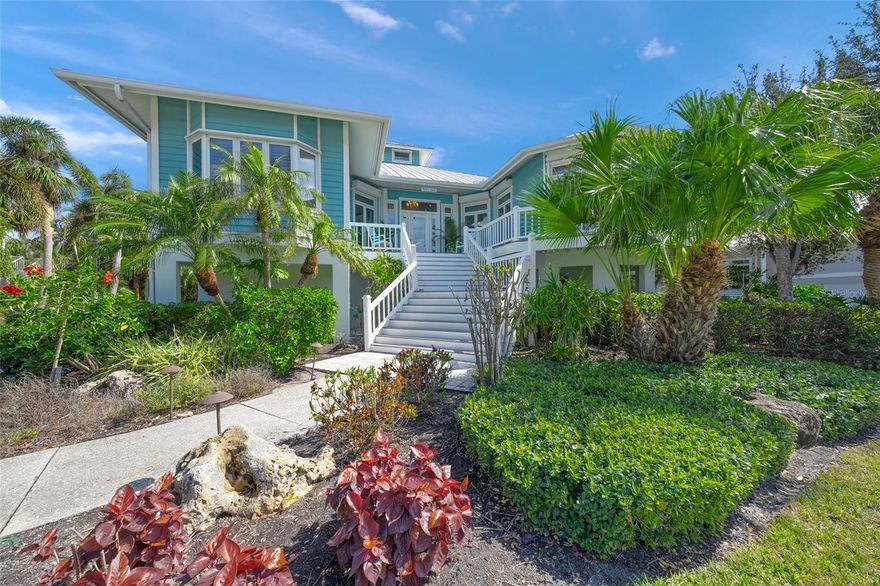 Experience refined coastal living in this Key West–style pool home within Eagle Point Club, a historic gated waterfront community in Venice. This 4-bedroom plus study, 3.5-bath residence spans more than 3,700 square feet and blends timeless architectural detail with modern convenience. Recent upgrades include designer lighting, a new cooling system, renovated primary bath, elevator, and fresh interior paint. The chef’s kitchen showcases quartz countertops, a Wolf gas cooktop, Sub-Zero and GE Cafe appliances, and opens to an airy great room with soaring ceilings. Sliding glass doors lead to a screened lanai with a heated pool, ideal for indoor-outdoor entertaining. A first-floor cabana suite and oversized garage with workshop offer added flexibility. Boaters enjoy a dedicated boat slip with a 14,000 lb. lift, providing quick access to the Gulf. Residents of Eagle Point Club enjoy a clubhouse, tennis and pickleball courts, guest cottages, and marina. Conveniently located near Venice Beach, downtown Venice, dining, and parks. Owner financing available.