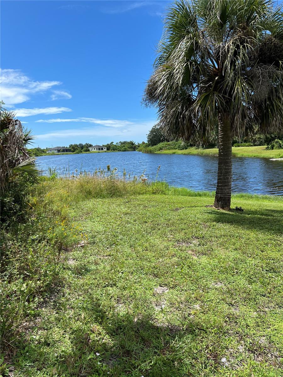 Discover the perfect canvas for your dream home with this stunning waterfront lot, ideally positioned to face the Southeast. Imagine relaxing on your back lanai, soaking in breathtaking sunsets that paint the sky in vibrant hues. With all utilities readily available in the area, building your ideal retreat has never been easier. Additionally, the adjacent lot is also for sale, providing a unique opportunity to expand your property. The seller, who owns both lots, is willing to give a slight discount for a combined purchase, making this an exceptional investment opportunity.