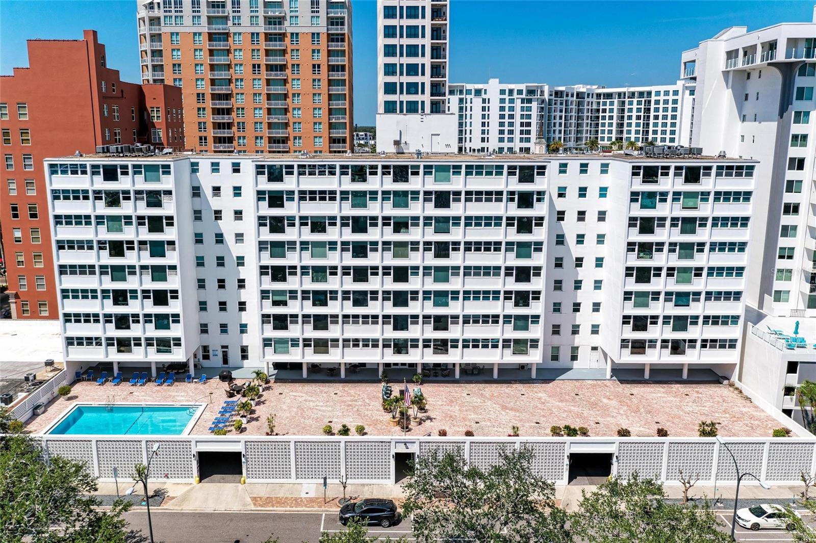 This gorgeous, renovated, updated Light and Bright condo will surely catch your attention! Located in the heart of downtown, this beautiful 2-bedroom, 2-bath condo overlooks Marina Jacks and offers the most amazing views of Sarasota Bay. All Bathrooms and Kitchen have been Beautifully updated and Magnificently decorated, featuring stunning quartz countertops, newer appliances, and a coordinating backsplash with an undermount kitchen sink. The elegant white cabinets include soft-close drawers and doors, adding a touch of sophistication to the space. Additional features include impact windows, crown molding, and custom woodwork on the walls and ceilings, providing both style and character. With plenty of storage throughout and an A/C system installed in 2019, this condo is both functional and beautiful. Don't miss out on this incredible opportunity for a second home, primary residence, or rental investment.This fabulous condo offers access to a stunning community pool and a well-equipped gym, perfect for both relaxation and fitness. The community pool provides a refreshing oasis for residents, featuring comfortable lounge areas where you can soak up the sun or relax in the shade. The gym is equipped with modern exercise machines and weights, catering to all your fitness needs. Whether you prefer a morning workout or an evening swim, this community amenity adds an extra layer of convenience to your lifestyle. Enjoy the perfect blend of leisure and wellness right at your doorstep! Walking distance to the finest Restaurants and shops. Amazing St. Armands Circle just minutes away and the worlds most beautiful beaches. The breathtaking views and prime location are sure to impress. You won’t be disappointed! Turnkey Furnishings Optional !!