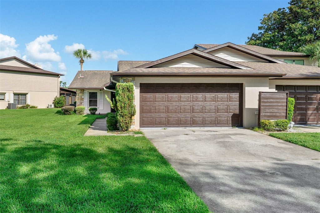 Photo of 107 Deer Lake Circle, Ormond Beach, FL 32174 (MLS # O6442001)
