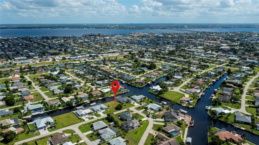 GULF ACCESS LOT - ALL ASSESSMENTS PAID - SEAWALL ALREADY INSTALLED- X-500 FLOOD ZONE!! Build your dream home on this Gulf access lot located in one of Cape Coral’s most desirable neighborhoods. This cleared home site is located on the Cologne Canal, and features a seawall already in place, and offers a short boat ride to restaurants, beaches, and the Gulf. Enjoy the convenience of being close to shopping, dining, and entertainment, with quick access to the Veterans Bridge for easy travel to Fort Myers and beyond. Ready for your custom build and Southwest Florida lifestyle.