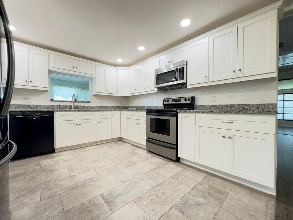 Photo of 580 Fairmount Drive, North Port, FL 34287 (MLS # C7512847)