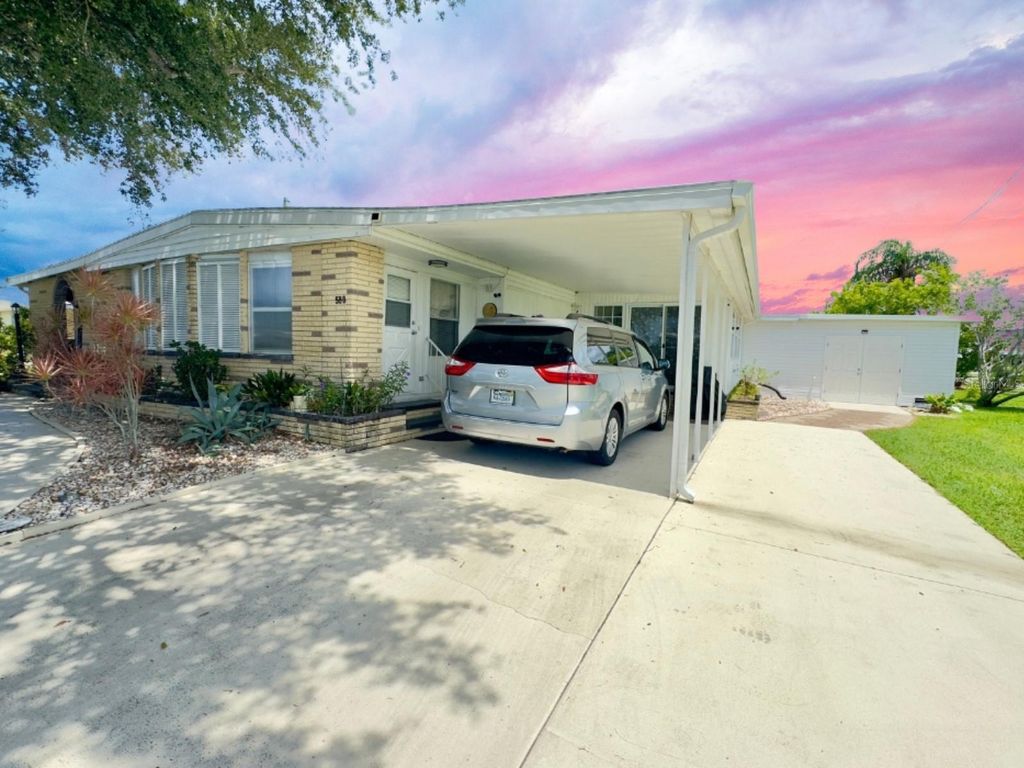 Photo of 580 Fairmount Drive, North Port, FL 34287 (MLS # C7512847)