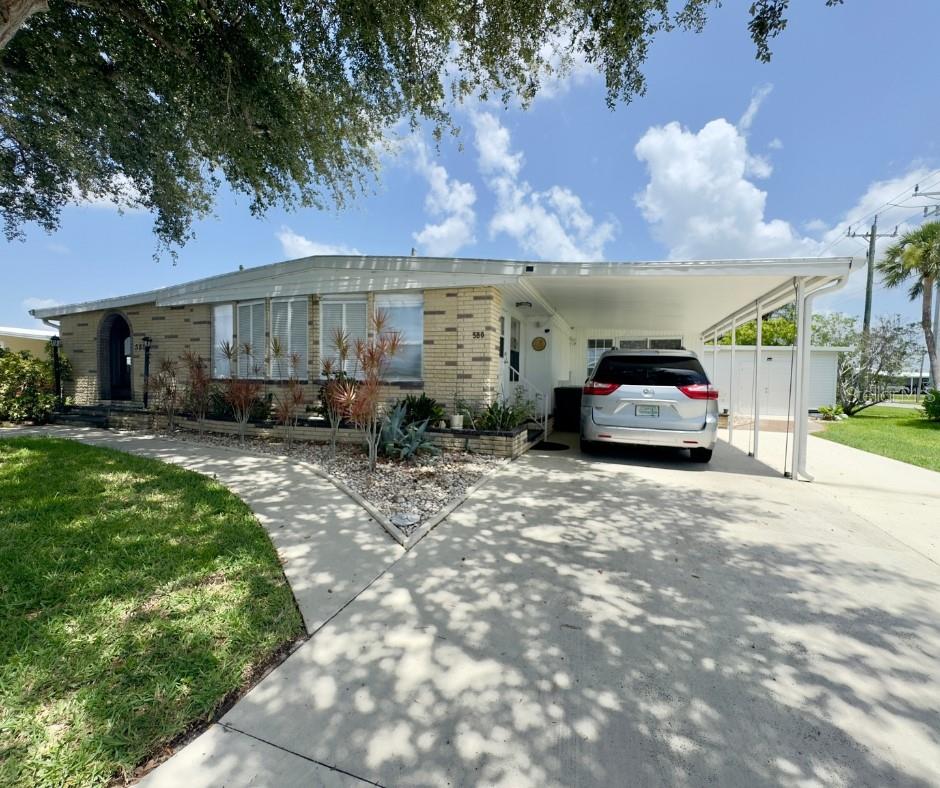 HUGE & BEAUTIFUL HOME on a CORNER DOUBLE LOT! Over 2,300 Sq Ft of Stylish, Updated Living! Discover the space, comfort, and upgrades you’ve been looking for in this expansive double-wide home sitting proudly on a rare corner double lot! With over 2,300 square feet of living area, this home offers room to relax, entertain, and live your best life. Step into the updated, modern kitchen; solid wood cabinets, granite counters, stainless steel appliances—perfectly designed with today’s finishes and functionality in mind. Expansive master bedroom, offering plenty of room for a king-sized bed and a sitting area. You'll love the oversized walk-in closet, providing ample space for organizing and storing your entire wardrobe with ease. The luxurious master bathroom features generous proportions and is designed for comfort, complete with a large vanity, walk-in shower, and plenty of natural light. Your guests will feel right at home in this generously sized guest bedroom, perfect for comfort and privacy. Featuring a large walk-in closet, there’s plenty of storage space for extended stays or extra belongings. Whether used for guests, a home office, or a second master, this versatile room offers both function and flexibility in a beautifully designed space. Three full, beautifully updated bathrooms, an indoor laundry room conveniently located just off the enclosed porch, and no shortage of space or style. Enjoy the charming screened-in porch for bug-free evenings and a sunny open patio for gatherings under the sky. The home’s exterior stuns with its brick façade, Bahama shutters, and corner-lot presence. This home is beautiful—it’s built to last, with major system upgrades including a 2023 roof, 2022 HVAC mini-split system and ductwork, 2021 water heater, newer electric box, plus a new vapor barrier and tie downs for added protection and peace of mind. Don’t miss your chance to own this one-of-a-kind property with unbeatable space, updates, and curb appeal. Experience the best of Florida’s retirement lifestyle; Harbor Cove, a sought-after 55+ waterfront community along the scenic Myakka River, filled with resort-style amenities. Low monthly HOA fee of just $150 a month! Includes access to two sparkling heated pools, a relaxing spa, a well-equipped fitness center, a clubhouse overlooking the stunning marina, shuffleboard, horseshoes, pickleball, tennis, and bocce courts. Socialize and stay active with dances, parties, water aerobics, fitness classes, art classes, woodworking, golf cart parades, bingo, dances, and more. Boat clubs, a craft room, picnics on the patio, golf clubs, bowling clubs and much more. There is plenty of wildlife to enjoy in this 190-acre community; herons, egrets, cranes, ibis, parrots, even alligators and manatees! Conveniently located within minutes of Downtown Wellen Park, Costco, shopping, restaurants, and a short drive to beautiful Gulf Beaches. Schedule a viewing today and let this dream home become your reality!