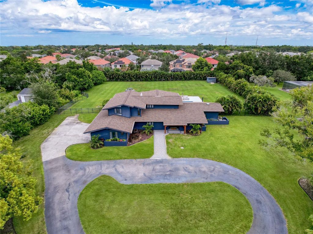 Photo of 2270 Ranchette Lane, Dunedin, FL 34698 (MLS # W7878958)