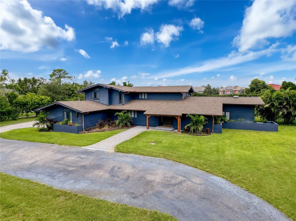 Photo of 2270 Ranchette Lane, Dunedin, FL 34698 (MLS # W7878958)