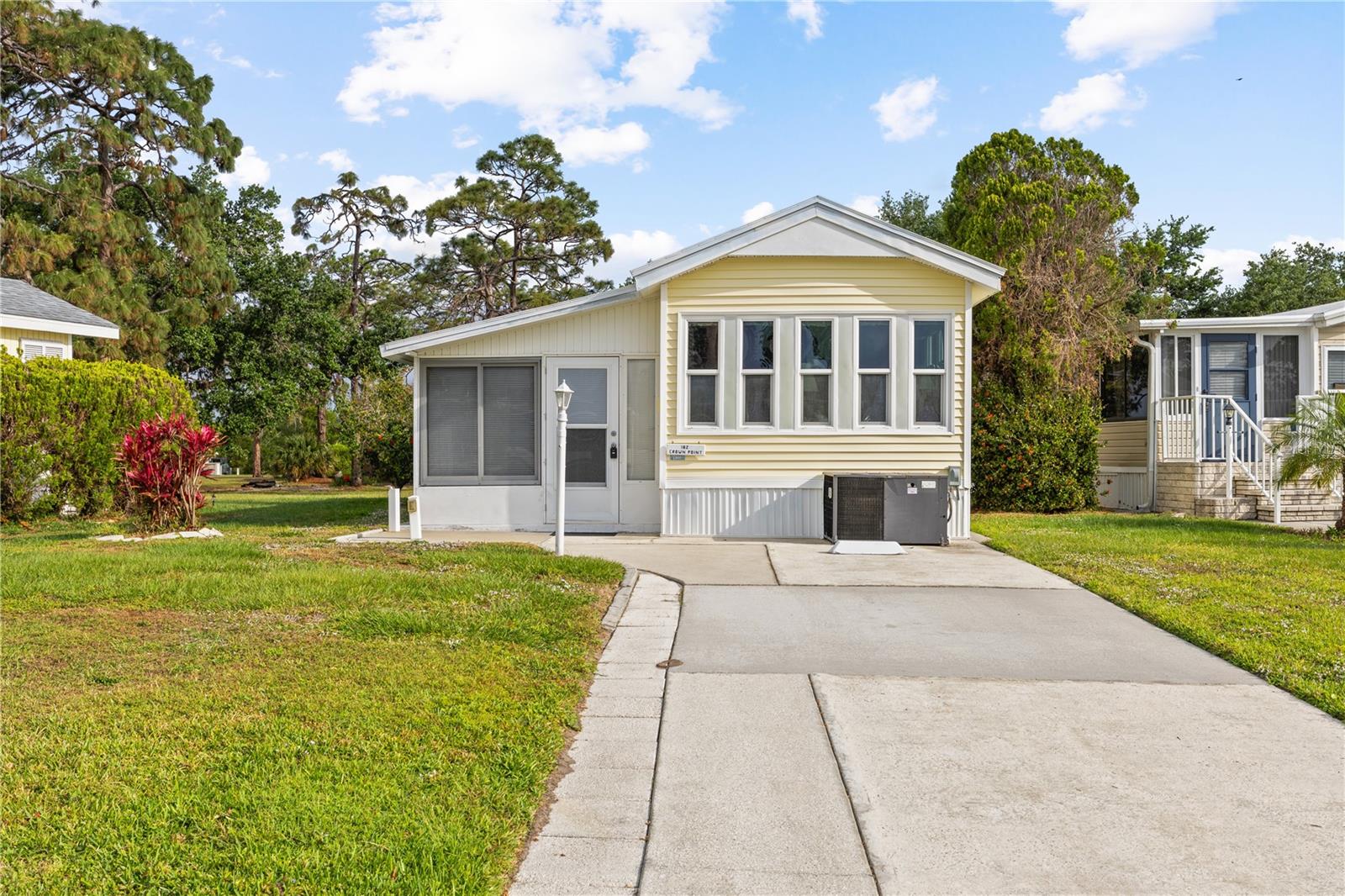 Tucked on a quiet street in the well-maintained community of King’s Gate Park in Nokomis, this charming home offers a peaceful, easygoing lifestyle just minutes from Florida’s Gulf Coast. Whether you're looking for a seasonal escape or a full-time residence, this turnkey furnished home is move-in ready and perfectly positioned to enjoy everything the area has to offer.
What makes this lot truly special is the setting—it backs up to open green space and mature trees, offering privacy, serenity, and a lovely view to enjoy from your window or while relaxing outside. Inside, the layout is light and welcoming, with comfortable furnishings and a washer and dryer included for added convenience. Simply unpack and start living the Florida lifestyle.
King’s Gate Park is a hidden gem—an active 55+ community with a friendly, small-town feel. Residents enjoy amenities like a heated pool, clubhouse, tennis and pickleball courts, shuffleboard, and social events throughout the year. Whether you want to stay active, connect with neighbors, or just relax in the sunshine, there’s something here for everyone.
Located just minutes from Nokomis Beach, downtown Venice, restaurants, and shopping, you’ll love the easy access to the coast without the congestion. If you're seeking a low-maintenance, peaceful retreat in a welcoming community—this is your spot.