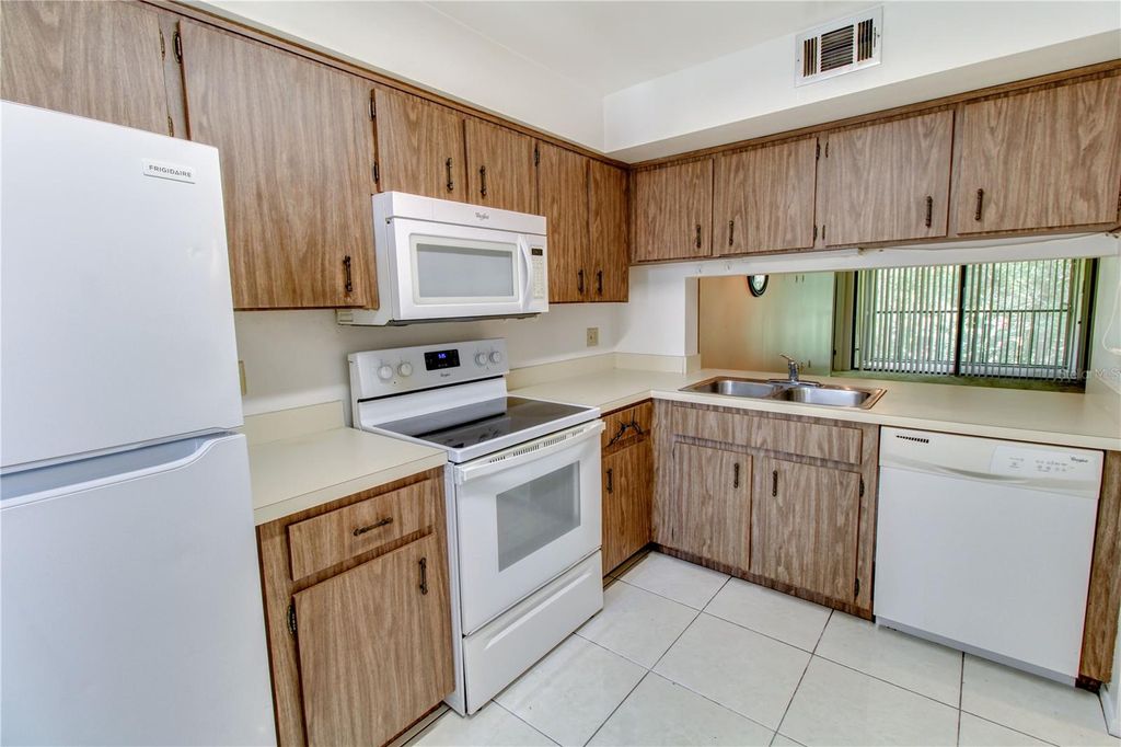 Photo of 3293 Westridge Boulevard #203, Orlando, FL 32822 (MLS # O6379216)