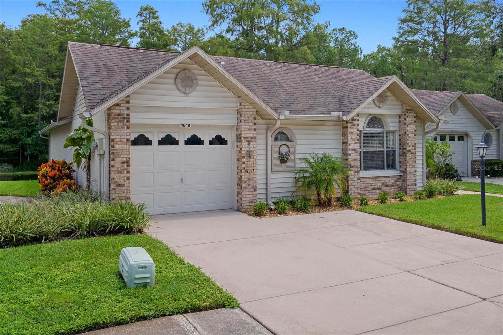 Welcome to this absolutely beautiful and meticulously upgraded home in the highly sought-after, maintenance-free 55+ community of Heritage Lakes. This pristine, move-in-ready home offers a rare opportunity to experience luxury living, with no detail overlooked.
The home boasts an inviting brick paver deck and oversized tile flooring throughout, giving it a clean, modern aesthetic. The spacious master suite is a true retreat, featuring a spa-like bathroom with dual vanities and gleaming granite countertops. The master bedroom also includes a large walk-in closet, providing ample storage space.
The gourmet kitchen is a chef’s dream with upgraded granite countertops and plenty of storage for all your culinary needs. Perfect for hosting guests, the open-concept design ensures effortless entertaining.
Heritage Lakes offers an active, vibrant lifestyle with access to a range of amenities, including a clubhouse, a sparkling pool, a fitness center, and a calendar full of social activities. Plus, with its prime location close to shopping, highways, and restaurants, everything you need is just a stone’s throw away.
This home truly has it all—luxury, convenience, and the perfect setting to unwind and enjoy your best years yet.