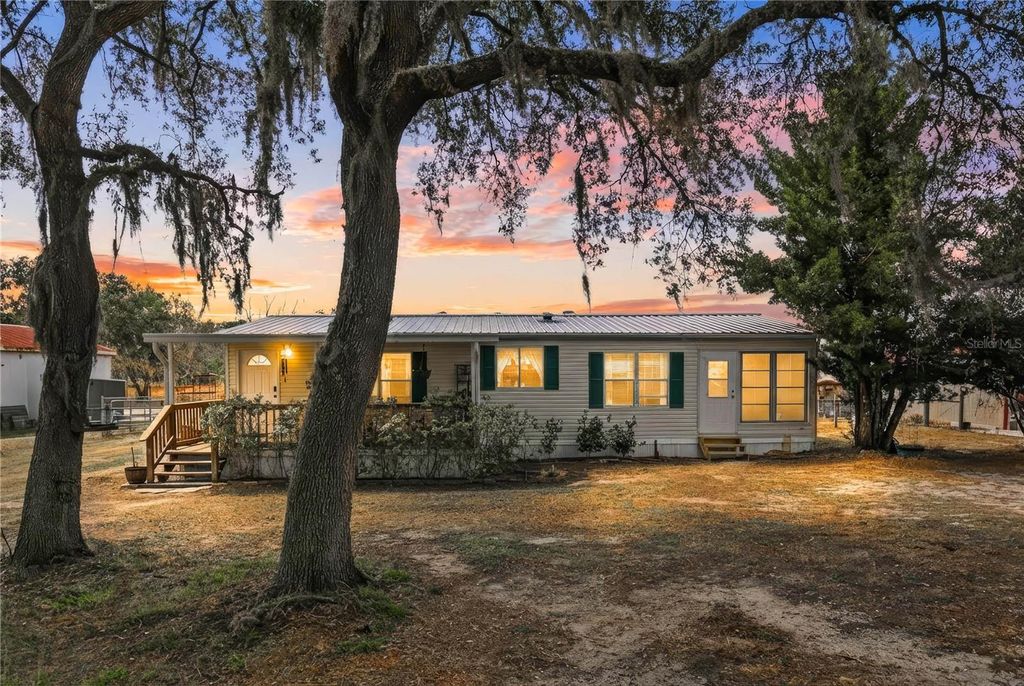 Photo of 9098 Lake Hatchineha Road, Haines City, FL 33844 (MLS # V4947545)
