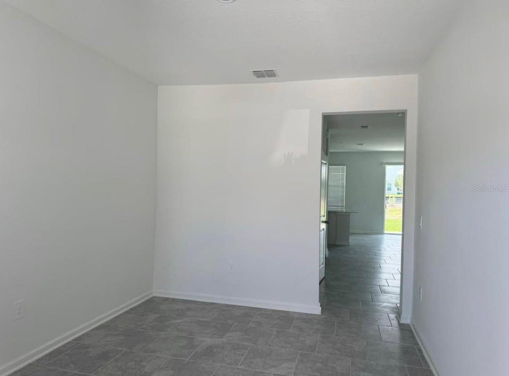 Photo of 3223 Laurent Loop, Davenport, FL 33837 (MLS # O6453517)