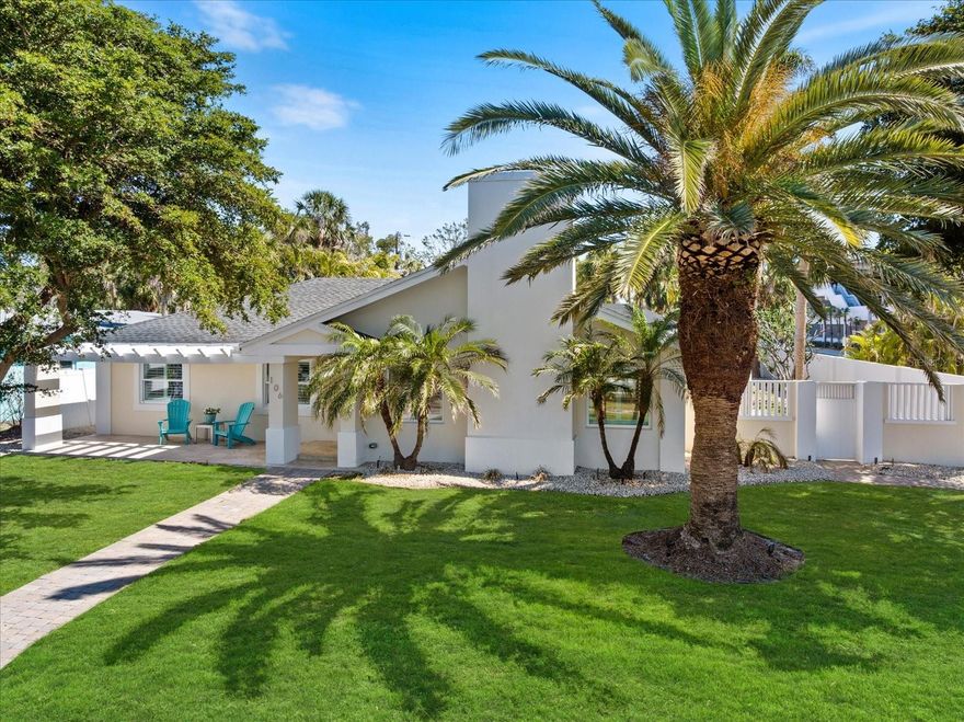 One or more photo(s) has been virtually staged. Experience the best of coastal living and investment opportunity with this beautifully renovated island retreat, ideally situated in the heart of St. Armands Circle on a oversized corner lot. Whether you're looking for a permanent residence or a high-demand vacation rental, this pristine home delivers both luxury and flexibility. The sunlit, open interior features custom carpentry, detailed moldings, and stylish coastal design throughout. Recent upgrades—including a new roof, impact-rated windows and doors, a fully remodeled kitchen, updated HVAC, pool pump, and water heater—provide modern comfort and long-term efficiency.

Relax by the screened-in pool, host gatherings in the spacious living areas, or enjoy al fresco dining on the private patio. Just minutes from Lido Beach, world-class dining, upscale boutiques, and the vibrant arts and culture of downtown Sarasota, this home is perfectly positioned for an elevated lifestyle or lucrative rental income. Whether you're living in it full time or offering it as a luxurious getaway, this coastal haven embodies the essence of relaxed island elegance.