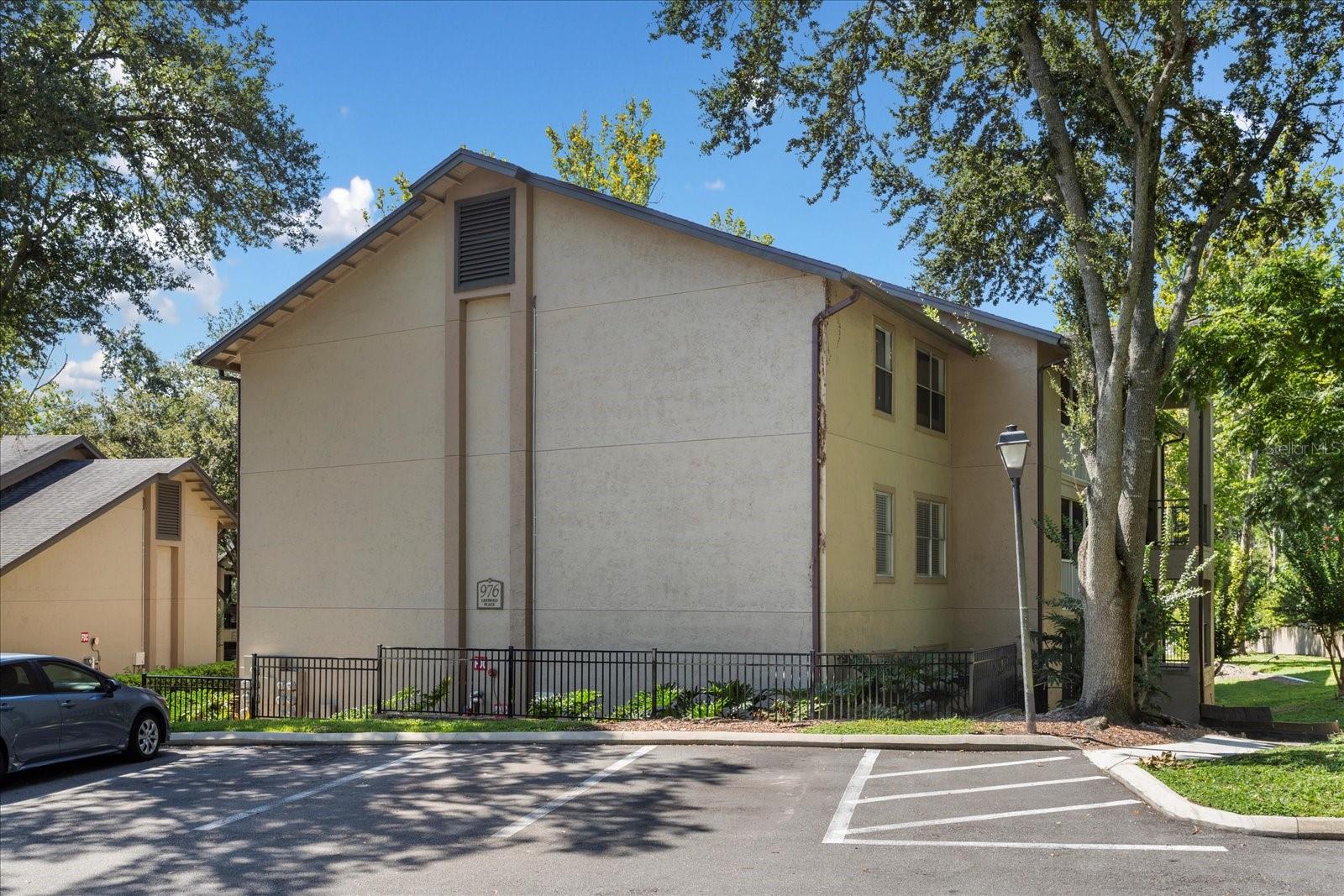 Welcome to this charming and upgraded first-floor condominium in the desirable community of The Landings in Altamonte Springs! Featuring two bedrooms, two baths and over 950 square feet of living space, this unit is designed for comfort and convenience. Go onto the welcoming screened-in front porch before entering a spacious split-plan layout with tile floors throughout and plenty of natural light. The beautifully updated eat-in kitchen shines with granite countertops, stainless steel appliances, breakfast bar seating, and a defined dining space, making it ideal for everyday meals or that special dinner in with company. Both bedrooms offer large walk-in closets, while the baths have been stylishly upgraded with granite vanities, including an en-suite bath for the second bedroom. Additional highlights include an interior laundry room with washer and dryer included, plus peace of mind with major updates—roof (2019), air conditioner (2017), and water heater (2018). The Landings is a well-maintained community offering resort-style amenities such as a clubhouse, fitness center, and two sparkling pools with a spa, all in a prime location close to Interstate 4, shopping, dining and entertainment. Move-in ready, this adorable condominium offers a blend of style, function and lifestyle—don’t miss the opportunity to make it yours!